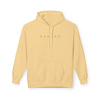 Yellow hoodie with 'SHAZOO' text on a white background