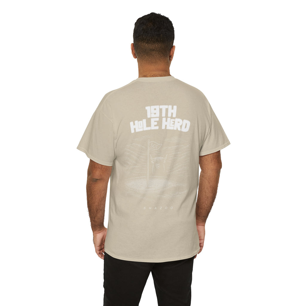 Man wearing a beige t-shirt with '18th Hole Hero' text on the back, standing against a white background