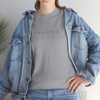 Person wearing a gray t-shirt with 'SHAZOO' text and a denim jacket indoors.
