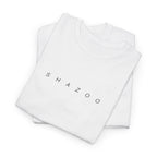 Stack of white shirts with 'SHAZOO' branding on a white background