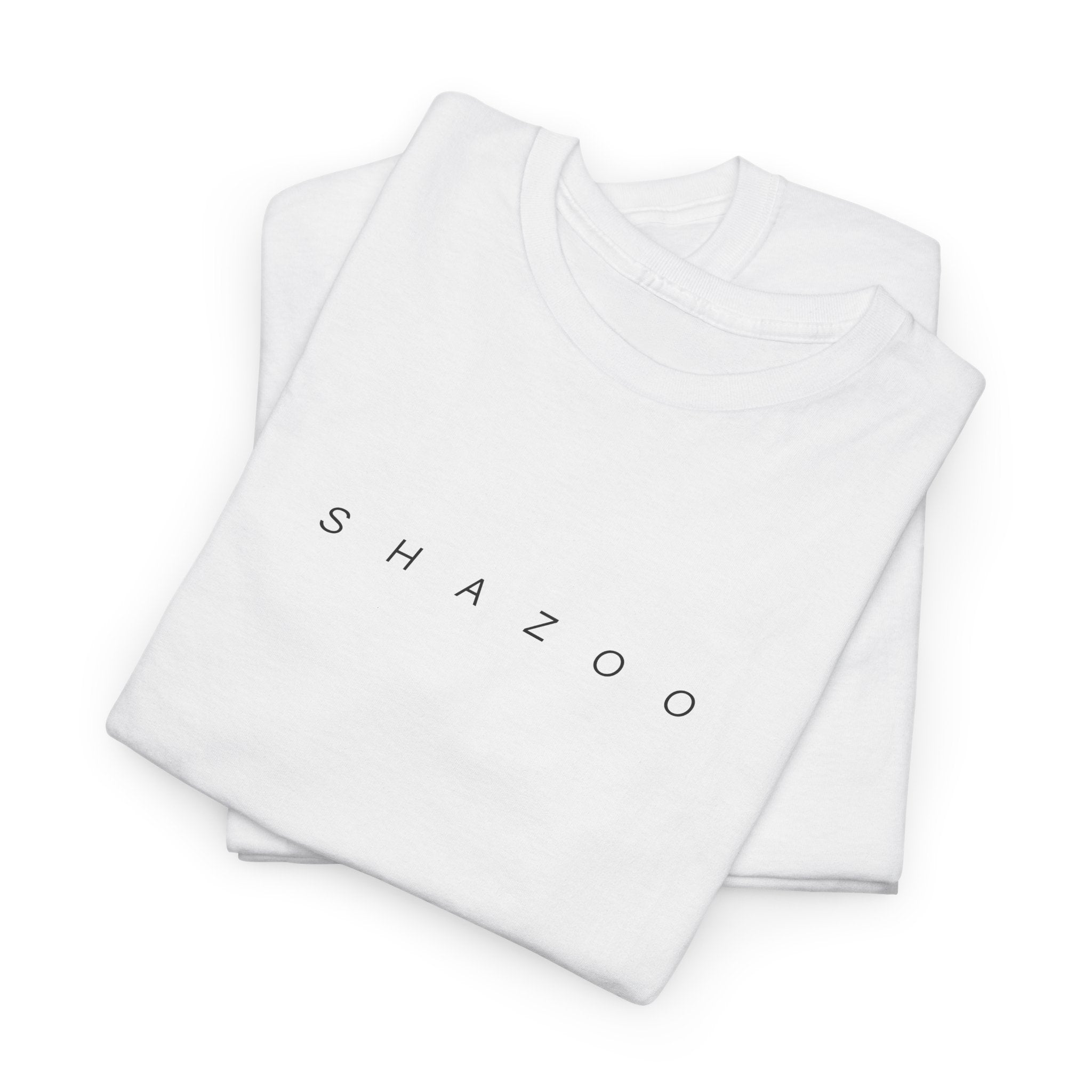 Stack of white shirts with 'SHAZOO' branding on a white background